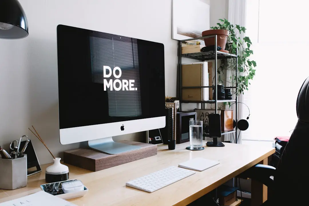 My current desk setup as of 2016. I am a wedding and portrait photographer and have always believed the space you do work in has a big impact on the quality and kind of work you complete. I have been refining my workspace since I was in high school and I am really happy where it is now! by Teacher Supply Store silver iMac with keyboard and trackpad inside room