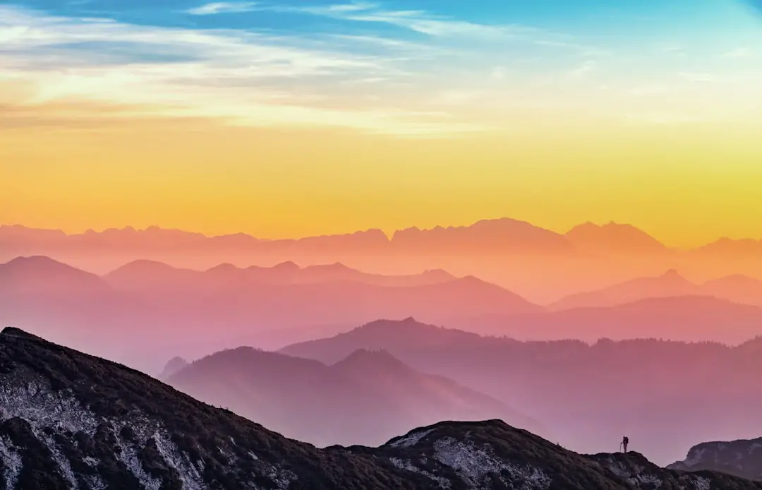 Pink toned thoughts on a hike —
Everything comes in waves,
even mountains. by Teacher Supply Store landscape photography of mountains