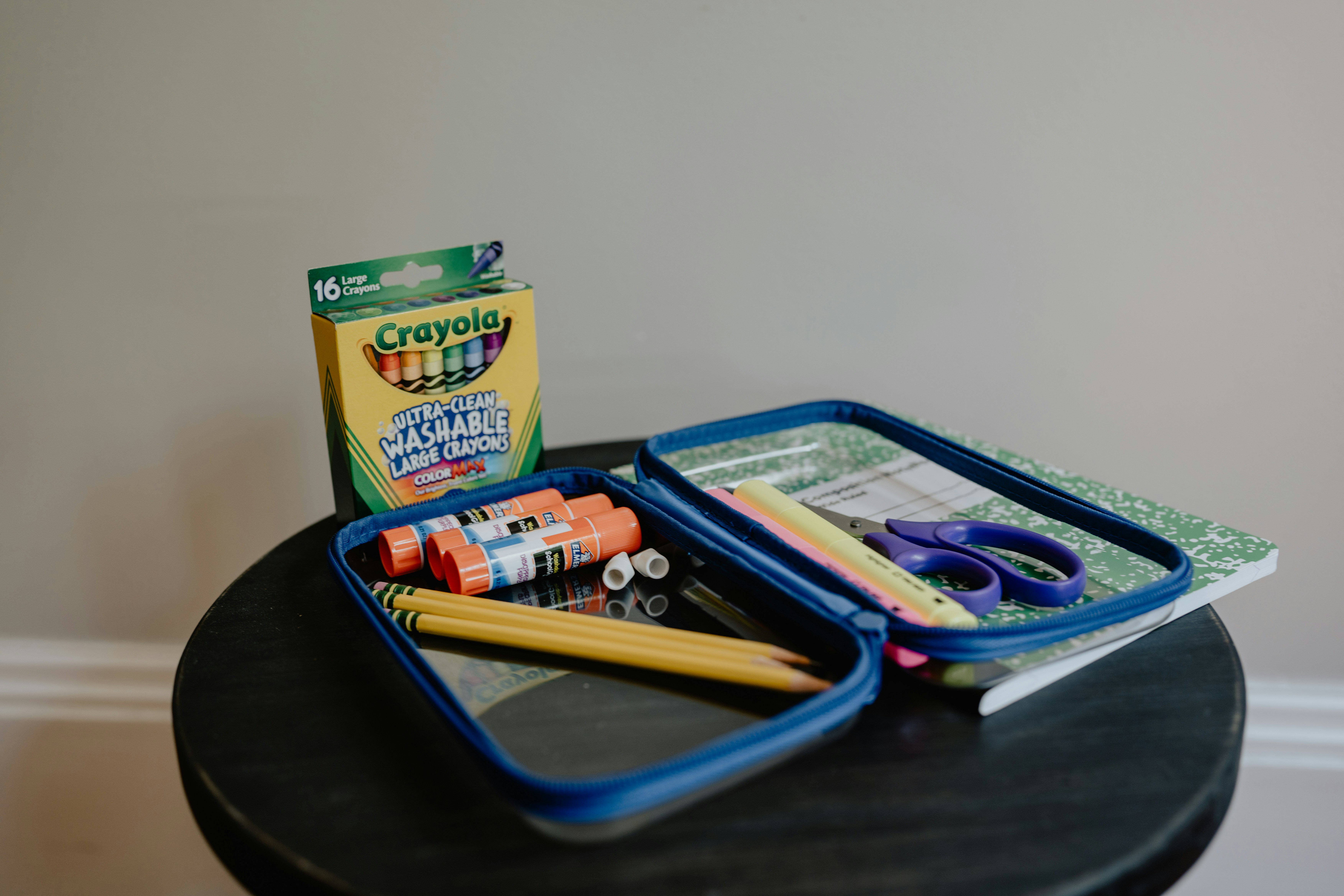 a box of toothbrushes and a box of toothpaste